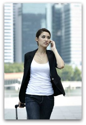 Woman using cell phone in HK